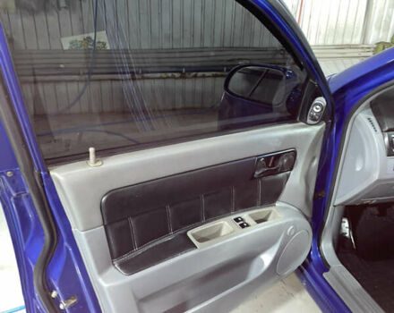 Синій Шевроле Лачетті, об'ємом двигуна 1.8 л та пробігом 251 тис. км за 4200 $, фото 21 на Automoto.ua