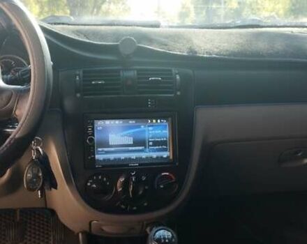 Синий Шевроле Лачетти, объемом двигателя 1.8 л и пробегом 220 тыс. км за 4000 $, фото 12 на Automoto.ua