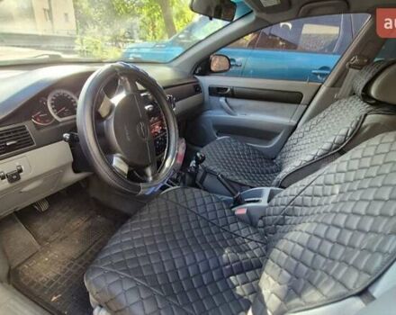 Синий Шевроле Лачетти, объемом двигателя 1.6 л и пробегом 243 тыс. км за 3800 $, фото 18 на Automoto.ua