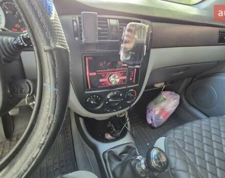 Синий Шевроле Лачетти, объемом двигателя 1.6 л и пробегом 243 тыс. км за 3800 $, фото 16 на Automoto.ua