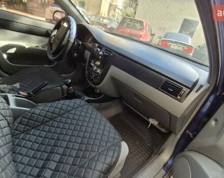 Синий Шевроле Лачетти, объемом двигателя 1.6 л и пробегом 243 тыс. км за 3800 $, фото 11 на Automoto.ua