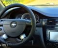 Синій Шевроле Лачетті, об'ємом двигуна 1.8 л та пробігом 206 тис. км за 3999 $, фото 6 на Automoto.ua