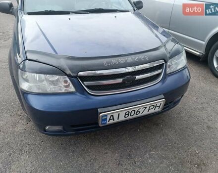 Синий Шевроле Лачетти, объемом двигателя 1.6 л и пробегом 290 тыс. км за 4300 $, фото 13 на Automoto.ua