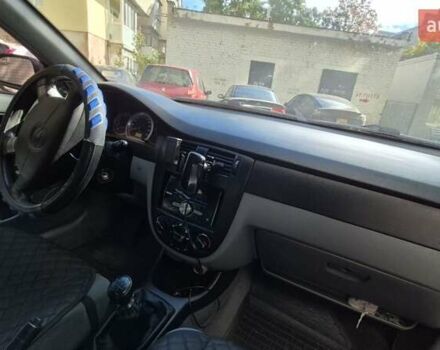 Синий Шевроле Лачетти, объемом двигателя 1.6 л и пробегом 243 тыс. км за 3800 $, фото 12 на Automoto.ua