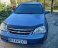 Синій Шевроле Лачетті, об'ємом двигуна 1.8 л та пробігом 247 тис. км за 3250 $, фото 12 на Automoto.ua