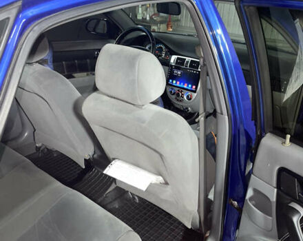 Синій Шевроле Лачетті, об'ємом двигуна 1.8 л та пробігом 251 тис. км за 4200 $, фото 17 на Automoto.ua