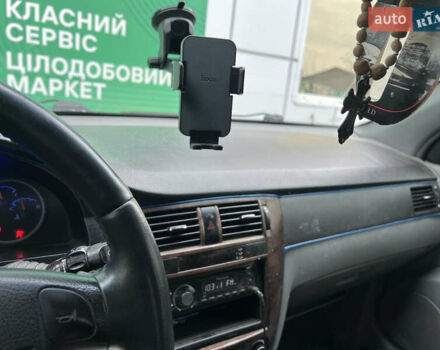 Синій Шевроле Лачетті, об'ємом двигуна 1.8 л та пробігом 407 тис. км за 2999 $, фото 8 на Automoto.ua