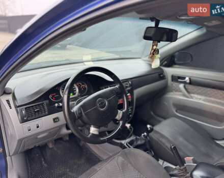 Синій Шевроле Лачетті, об'ємом двигуна 1.6 л та пробігом 346 тис. км за 3499 $, фото 15 на Automoto.ua