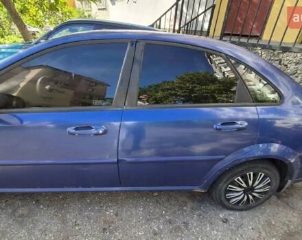 Синий Шевроле Лачетти, объемом двигателя 1.6 л и пробегом 243 тыс. км за 3800 $, фото 2 на Automoto.ua