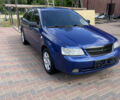 Синий Шевроле Лачетти, объемом двигателя 1.6 л и пробегом 255 тыс. км за 4200 $, фото 2 на Automoto.ua