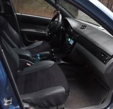 Синий Шевроле Лачетти, объемом двигателя 1.6 л и пробегом 187 тыс. км за 3900 $, фото 11 на Automoto.ua