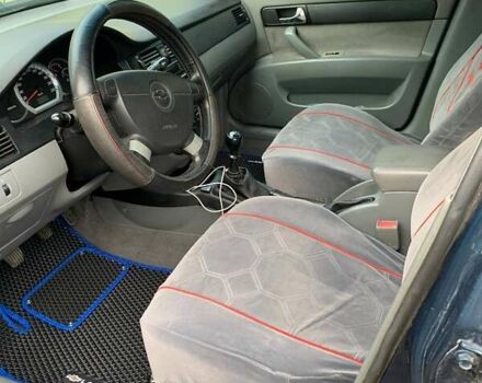 Синий Шевроле Лачетти, объемом двигателя 1.8 л и пробегом 240 тыс. км за 5400 $, фото 7 на Automoto.ua