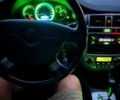 Синій Шевроле Лачетті, об'ємом двигуна 1.8 л та пробігом 250 тис. км за 5975 $, фото 7 на Automoto.ua