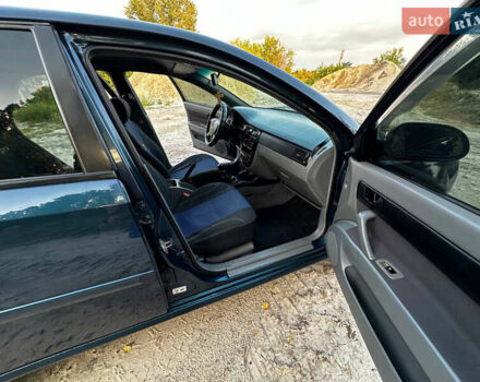 Синий Шевроле Лачетти, объемом двигателя 1.6 л и пробегом 290 тыс. км за 5000 $, фото 4 на Automoto.ua