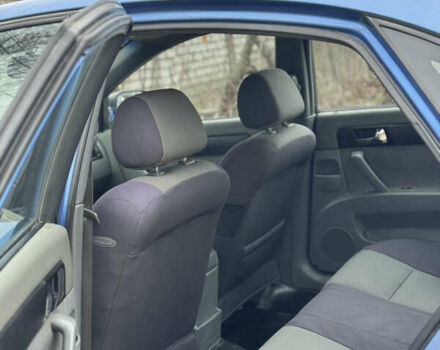 Синий Шевроле Лачетти, объемом двигателя 1.8 л и пробегом 178 тыс. км за 3950 $, фото 11 на Automoto.ua