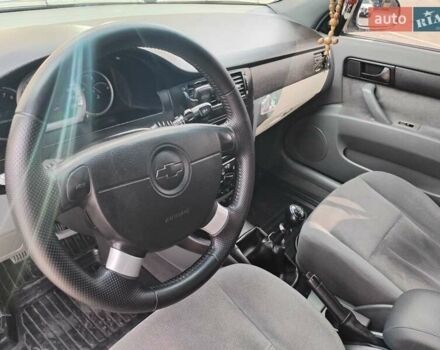 Синий Шевроле Лачетти, объемом двигателя 1.6 л и пробегом 223 тыс. км за 3800 $, фото 5 на Automoto.ua