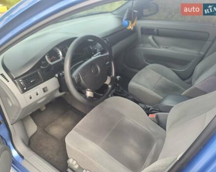 Синій Шевроле Лачетті, об'ємом двигуна 1.6 л та пробігом 255 тис. км за 4500 $, фото 21 на Automoto.ua