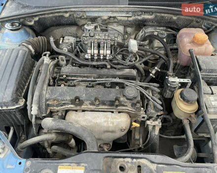 Синий Шевроле Лачетти, объемом двигателя 1.6 л и пробегом 198 тыс. км за 3300 $, фото 38 на Automoto.ua