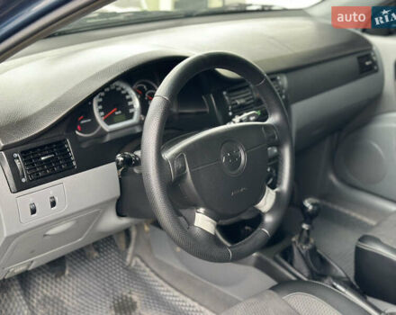 Синий Шевроле Лачетти, объемом двигателя 1.8 л и пробегом 234 тыс. км за 4350 $, фото 35 на Automoto.ua