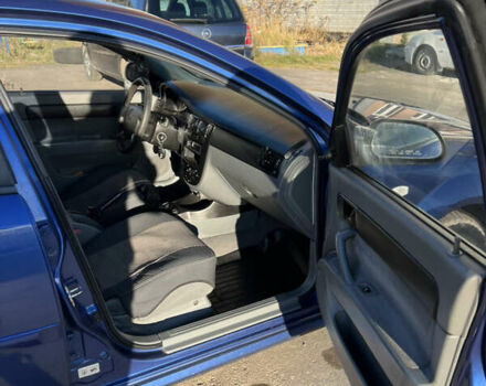 Синий Шевроле Лачетти, объемом двигателя 1.6 л и пробегом 215 тыс. км за 3499 $, фото 6 на Automoto.ua