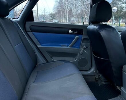 Синій Шевроле Лачетті, об'ємом двигуна 1.8 л та пробігом 221 тис. км за 4650 $, фото 12 на Automoto.ua