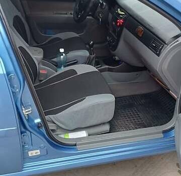 Синий Шевроле Лачетти, объемом двигателя 1.8 л и пробегом 233 тыс. км за 4700 $, фото 5 на Automoto.ua