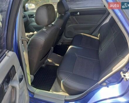 Синій Шевроле Лачетті, об'ємом двигуна 1.8 л та пробігом 290 тис. км за 4500 $, фото 9 на Automoto.ua