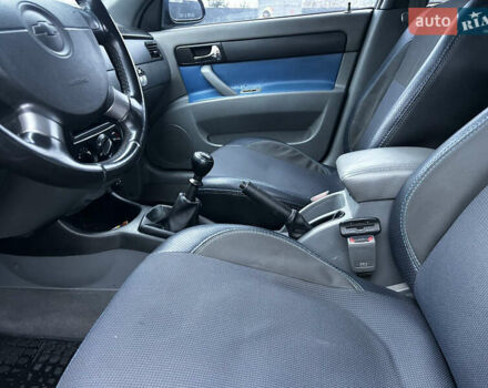 Синий Шевроле Лачетти, объемом двигателя 1.8 л и пробегом 221 тыс. км за 4650 $, фото 20 на Automoto.ua