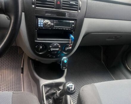 Синій Шевроле Лачетті, об'ємом двигуна 1.8 л та пробігом 241 тис. км за 5000 $, фото 6 на Automoto.ua