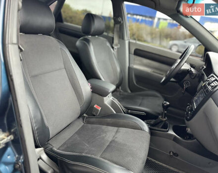 Синий Шевроле Лачетти, объемом двигателя 1.8 л и пробегом 234 тыс. км за 4350 $, фото 53 на Automoto.ua