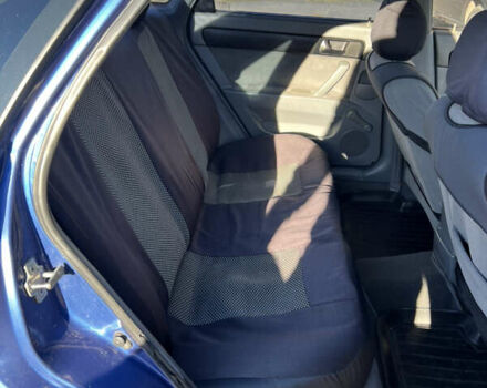 Синий Шевроле Лачетти, объемом двигателя 1.6 л и пробегом 215 тыс. км за 3499 $, фото 4 на Automoto.ua