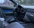 Синій Шевроле Лачетті, об'ємом двигуна 1.8 л та пробігом 221 тис. км за 4650 $, фото 11 на Automoto.ua