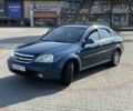 Синий Шевроле Лачетти, объемом двигателя 1.8 л и пробегом 240 тыс. км за 3650 $, фото 1 на Automoto.ua