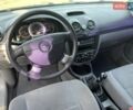 Синий Шевроле Лачетти, объемом двигателя 1.8 л и пробегом 257 тыс. км за 2900 $, фото 4 на Automoto.ua