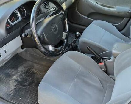 Синій Шевроле Лачетті, об'ємом двигуна 1.8 л та пробігом 229 тис. км за 3100 $, фото 9 на Automoto.ua