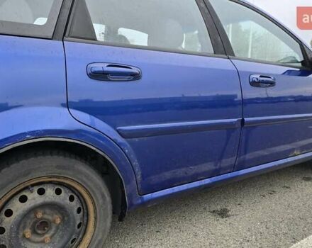 Синій Шевроле Лачетті, об'ємом двигуна 1.8 л та пробігом 229 тис. км за 3100 $, фото 5 на Automoto.ua