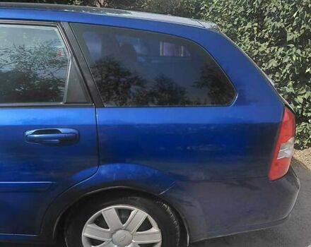 Синий Шевроле Лачетти, объемом двигателя 1.8 л и пробегом 300 тыс. км за 3976 $, фото 1 на Automoto.ua