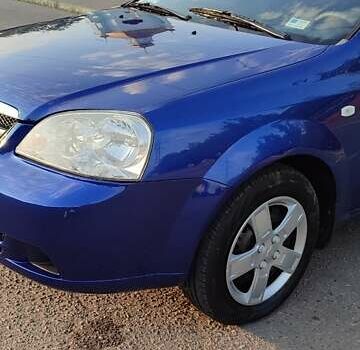 Синий Шевроле Лачетти, объемом двигателя 1.6 л и пробегом 233 тыс. км за 5200 $, фото 22 на Automoto.ua