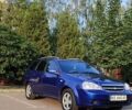 Синий Шевроле Лачетти, объемом двигателя 1.6 л и пробегом 233 тыс. км за 5200 $, фото 1 на Automoto.ua