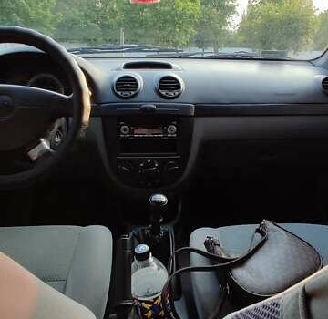 Синий Шевроле Лачетти, объемом двигателя 1.6 л и пробегом 233 тыс. км за 5200 $, фото 7 на Automoto.ua