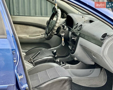 Синій Шевроле Лачетті, об'ємом двигуна 1.8 л та пробігом 186 тис. км за 4400 $, фото 15 на Automoto.ua