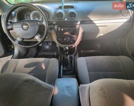 Синій Шевроле Лачетті, об'ємом двигуна 1.8 л та пробігом 228 тис. км за 5500 $, фото 7 на Automoto.ua