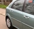 Зелений Шевроле Лачетті, об'ємом двигуна 1.8 л та пробігом 214 тис. км за 4100 $, фото 7 на Automoto.ua