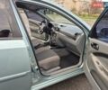 Зеленый Шевроле Лачетти, объемом двигателя 1.8 л и пробегом 203 тыс. км за 4200 $, фото 4 на Automoto.ua