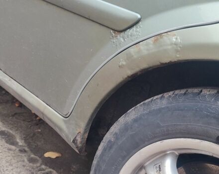 Зелений Шевроле Лачетті, об'ємом двигуна 1.8 л та пробігом 246 тис. км за 2000 $, фото 9 на Automoto.ua