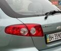 Зелений Шевроле Лачетті, об'ємом двигуна 1.8 л та пробігом 214 тис. км за 4100 $, фото 16 на Automoto.ua