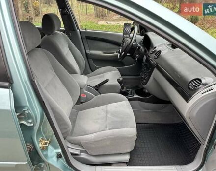 Зелений Шевроле Лачетті, об'ємом двигуна 1.8 л та пробігом 214 тис. км за 4100 $, фото 20 на Automoto.ua