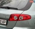 Зелений Шевроле Лачетті, об'ємом двигуна 1.8 л та пробігом 214 тис. км за 4100 $, фото 17 на Automoto.ua