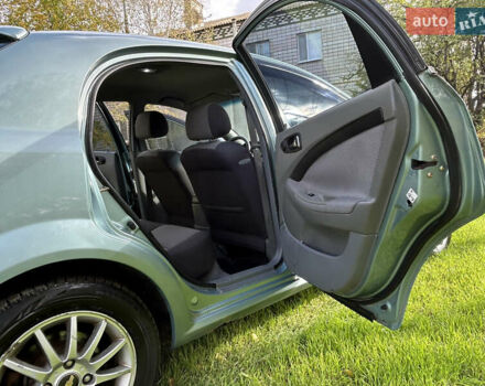 Зелений Шевроле Лачетті, об'ємом двигуна 1.8 л та пробігом 225 тис. км за 3950 $, фото 11 на Automoto.ua