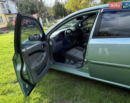 Зелений Шевроле Лачетті, об'ємом двигуна 1.8 л та пробігом 225 тис. км за 3950 $, фото 9 на Automoto.ua